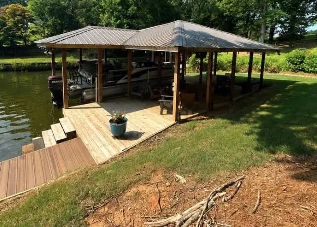 Lakeside boat dock with bright, clean decking after washing